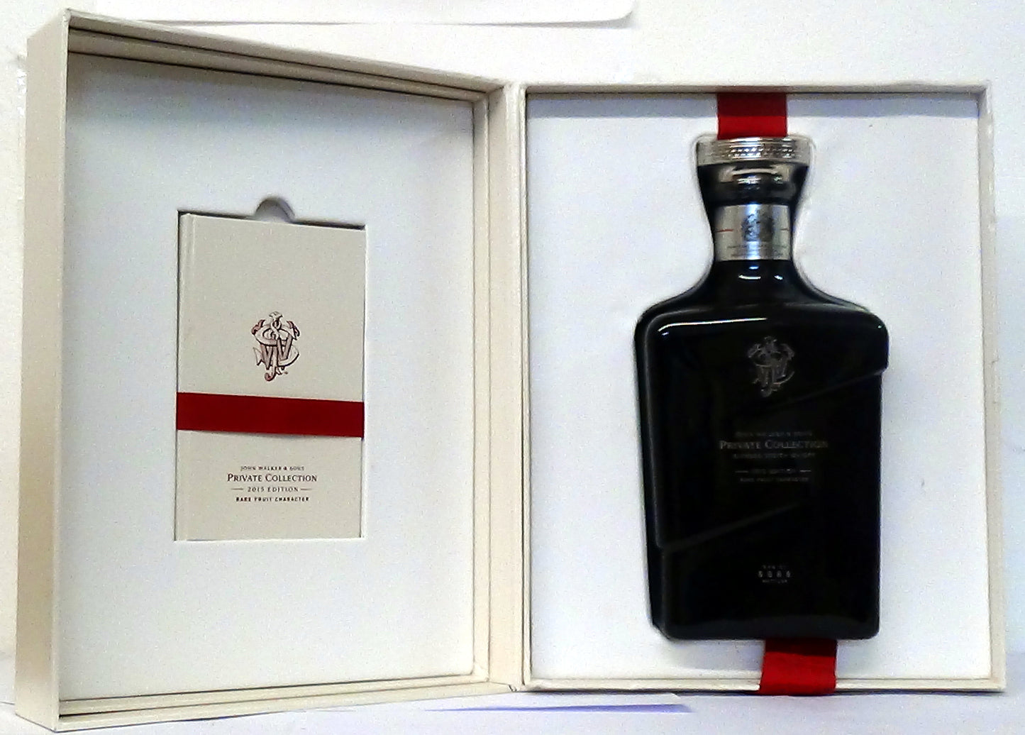 John Walker & Sons Private Collection Blended Scotch Whisky. 2015 Edition. Limited Release Bottle No 3135 of of 8888 bottles. 70cl, 46.8% vol. In presentation case with book (damp stains to box).