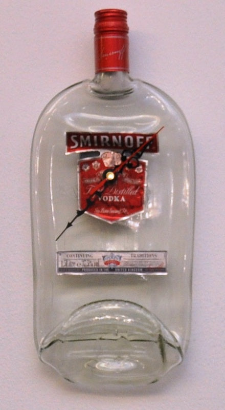 Distinctive 'melted bottle' look quartz analogue clocks. Give your hom